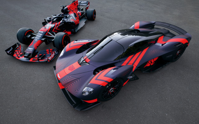 Futuristic car parking lot astronaut free wallpaper for desktop - medium preview image