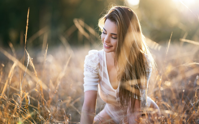 Woman field smiling blonde wind free wallpaper for desktop - medium preview image