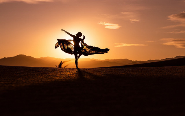 Dancing couple dirt sunset mountains free wallpaper for desktop - medium preview image