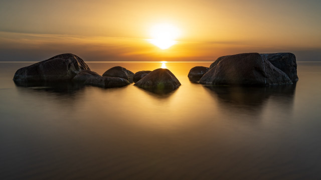 Sunset ocean rocks beach sunlight free wallpaper for desktop - medium preview image