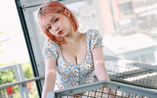 Pink hair flower shirt posing free wallpaper for desktop - medium preview image