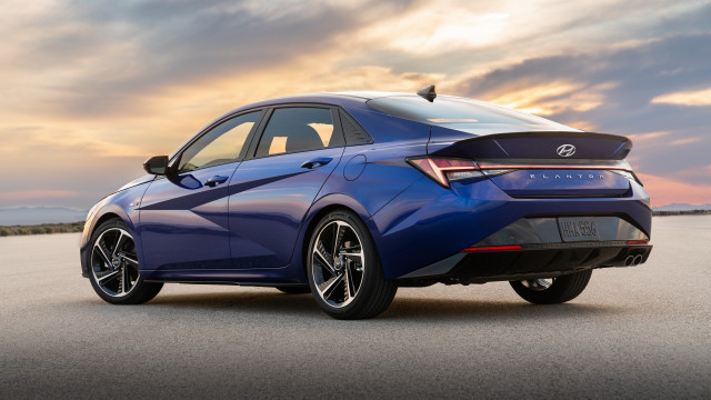 Blue car futurism sunset sideprofile free wallpaper for desktop - medium preview image