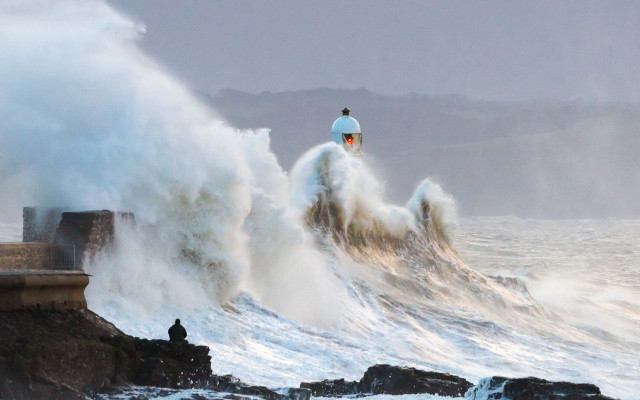 Lighthouse wave person shore ocean free wallpaper for desktop - medium preview image