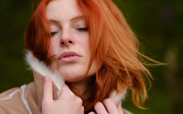 Red haired woman feather portrait free wallpaper for desktop - medium preview image