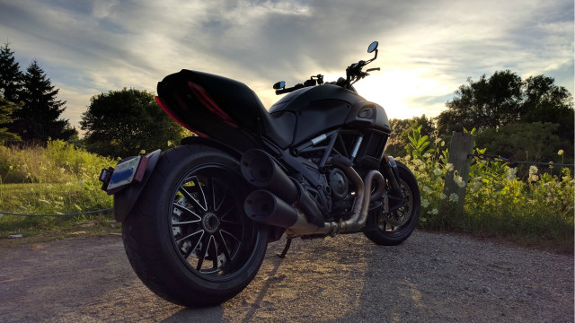 Motorcycle field flowers trees cloudy free wallpaper for desktop - medium preview image