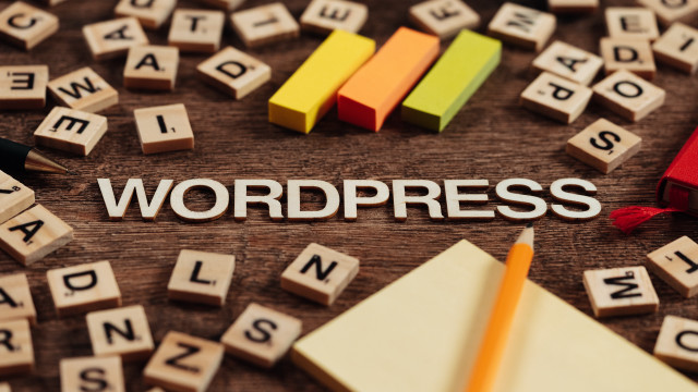 Wordpress wooden letters pencils table free wallpaper for desktop - medium preview image