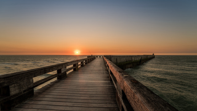 Long pier sunset person bridge free wallpaper for desktop - medium preview image