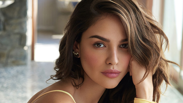 Woman yellow shirt earrings head free wallpaper for desktop - medium preview image