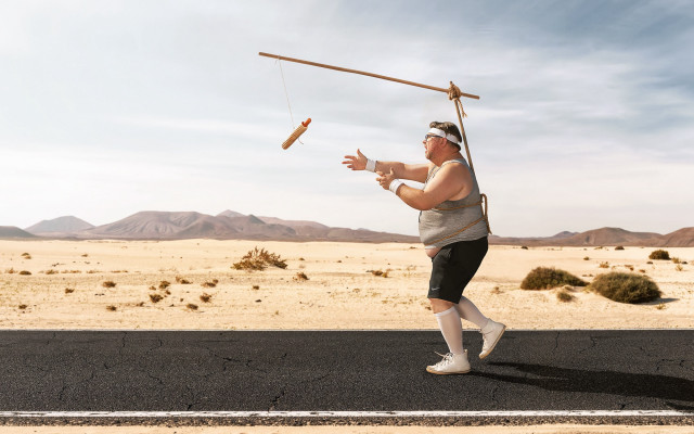 Man balancing pole beach desert free wallpaper for desktop - medium preview image