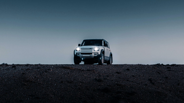 White suv hill dark sky free wallpaper for desktop - medium preview image