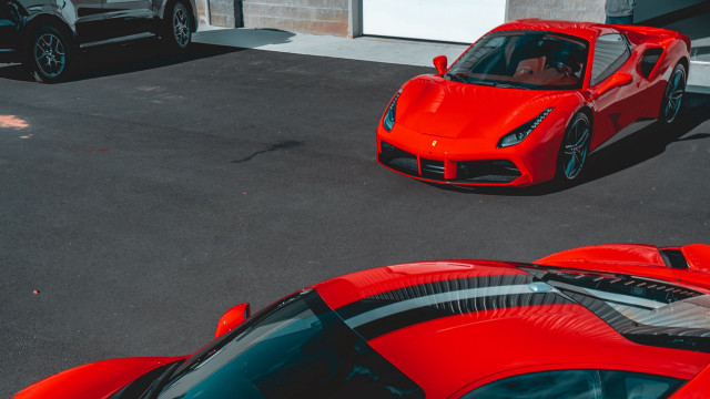 Red sports car parking lot #31 free wallpaper for desktop - medium preview image