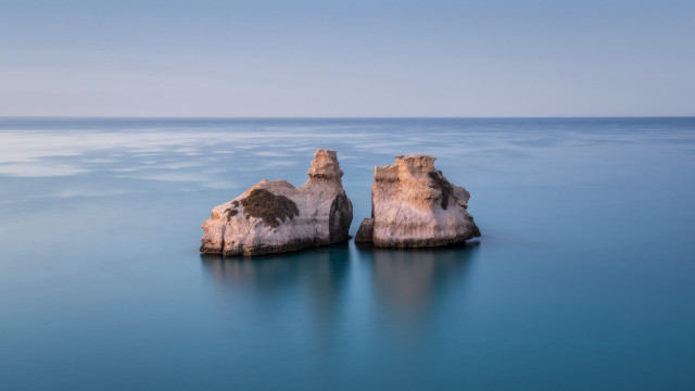 Ocean rock formation beach sky free wallpaper for desktop - medium preview image