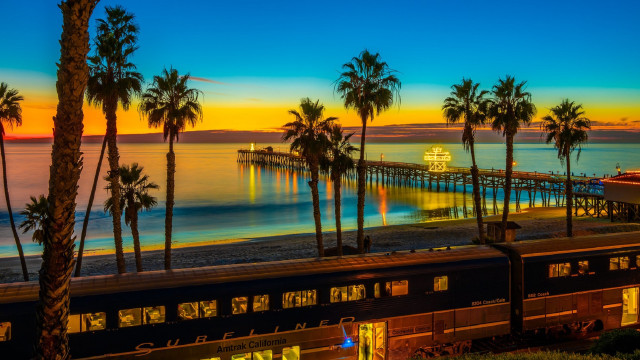 Train beach palm sunset fireworks free wallpaper for desktop - medium preview image