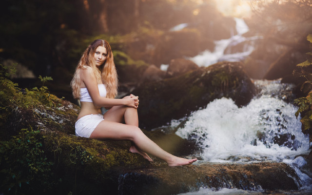 Woman sitting by waterfall forest free wallpaper for desktop - medium preview image