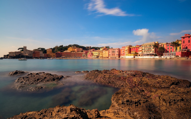 Beach buildings water rocks sunset free wallpaper for desktop - medium preview image