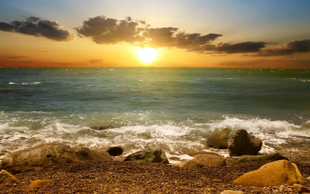 Sunset ocean rocks shore clouds free wallpaper for desktop - medium preview image