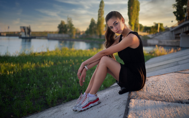Woman sitting lake sunset portrait free wallpaper for desktop - medium preview image