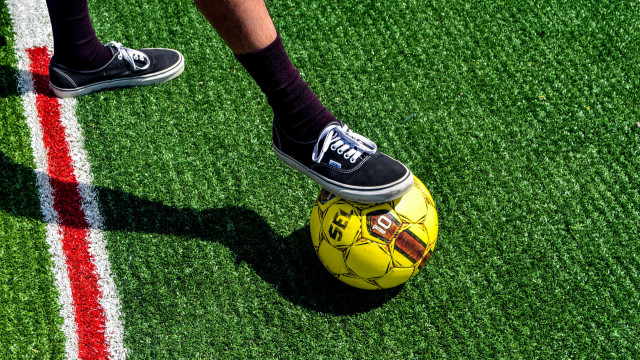 Athletic person standing on soccer free wallpaper for desktop - medium preview image