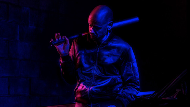 Man sitting bench bat leather free wallpaper for desktop - medium preview image