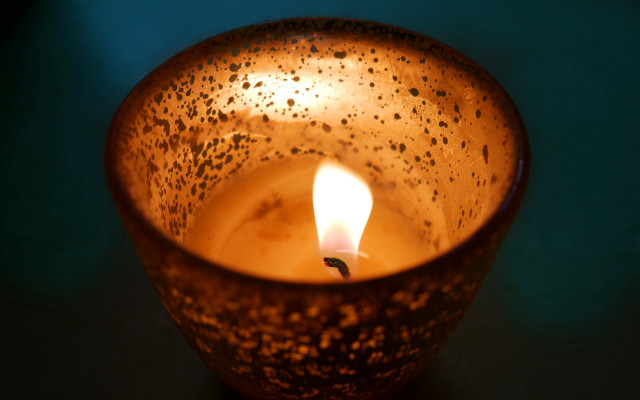 Lit candle dark room blue free wallpaper for desktop - medium preview image