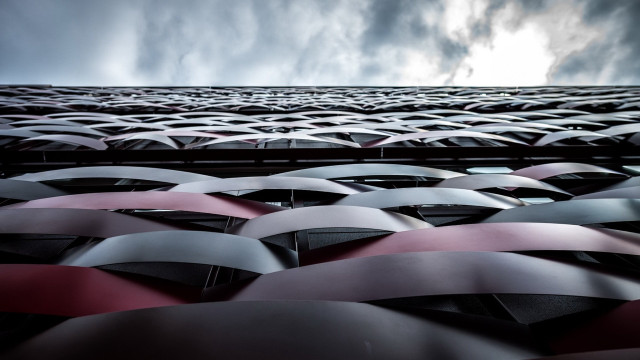 Umbrellas parking lot cloudy sky free wallpaper for desktop - medium preview image