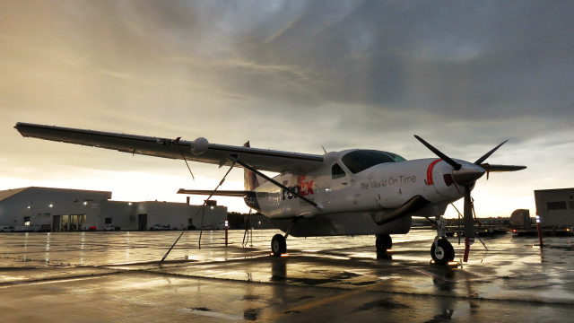 Small airplane tarmac cloudy sky free wallpaper for desktop - medium preview image