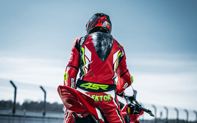 Red motorcycle rider track sky free wallpaper for desktop - medium preview image