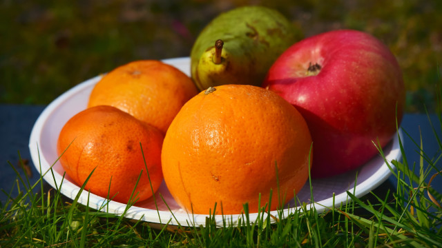 Fruit plate grass apples oranges free wallpaper for desktop - medium preview image