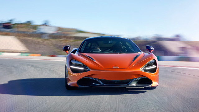 Orange sports car road blurry free wallpaper for desktop - medium preview image