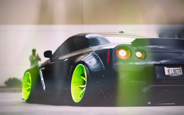 Black car yellow wheels green free wallpaper for desktop - medium preview image