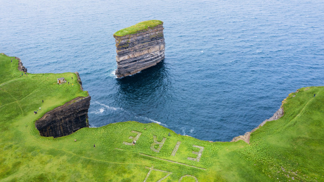 Rock formation water land art free wallpaper for desktop - medium preview image