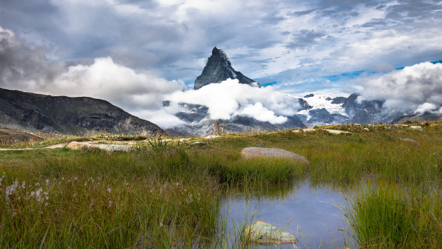 Mountain lake clouds rocks nature free wallpaper for desktop - medium preview image