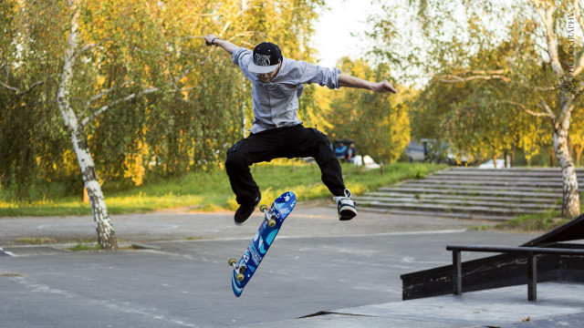 Man flying skateboard park trees free wallpaper for desktop - medium preview image