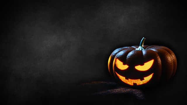 Carved pumpkin glowing eyes gothic free wallpaper for desktop - medium preview image