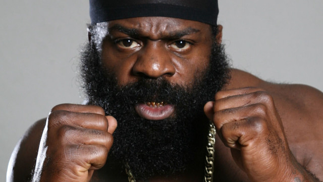 Bearded man chain fists raised free wallpaper for desktop - medium preview image