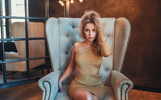 Woman chair cellphone hairdow portrait free wallpaper for desktop - medium preview image