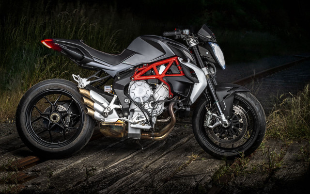 Motorcycle wooden platform dark background free wallpaper for desktop - medium preview image