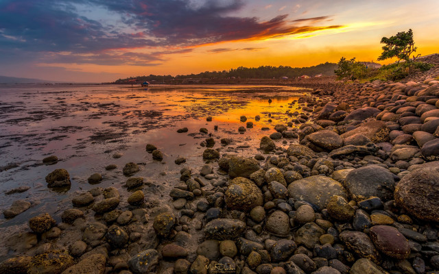 Sunset rocky beach dusk cityscape free wallpaper for desktop - medium preview image