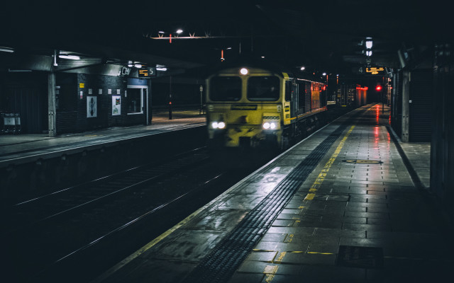 Train night city lights reflection free wallpaper for desktop - medium preview image