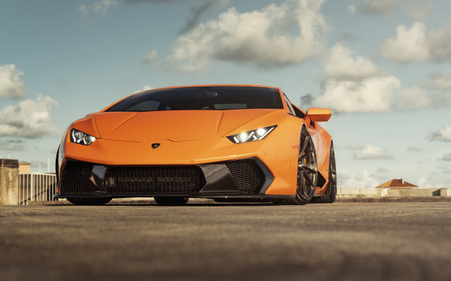 Orange sports car clouds blue free wallpaper for desktop - medium preview image
