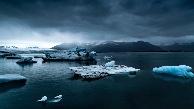 Icebergs water mountains sky bird free wallpaper for desktop - medium preview image