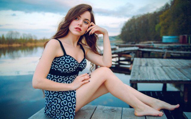 Woman dock sitting blue sky free wallpaper for desktop - medium preview image