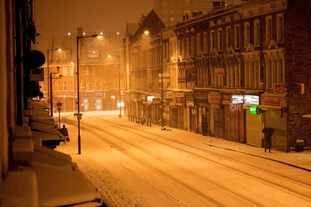 Snowy street buildings streetlight snow free wallpaper for desktop - medium preview image