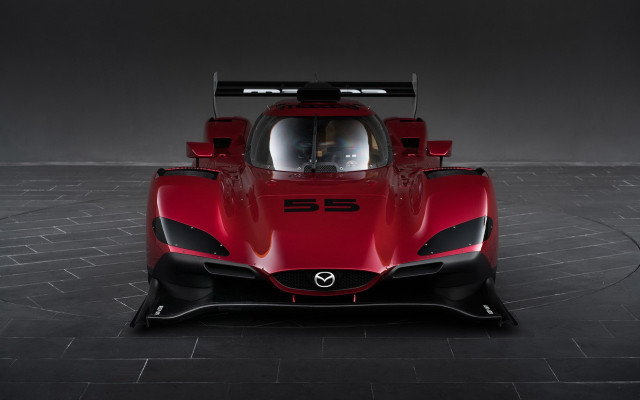 Red sports car black floor free wallpaper for desktop - medium preview image