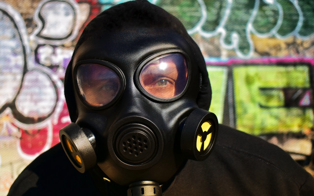 Man gasmask blackjacket graffiti depthoffield free wallpaper for desktop - medium preview image