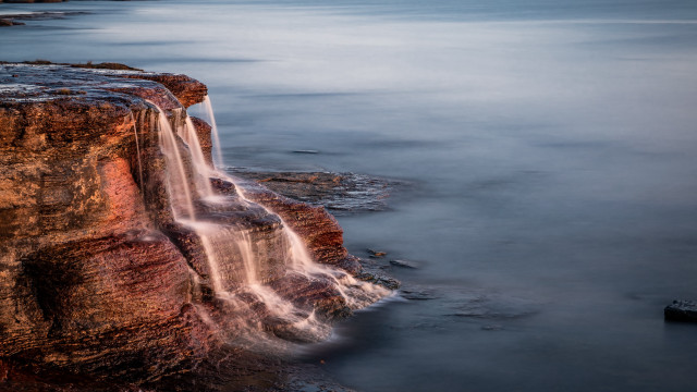 Waterfall cliff ocean dusk longexposure free wallpaper for desktop - medium preview image