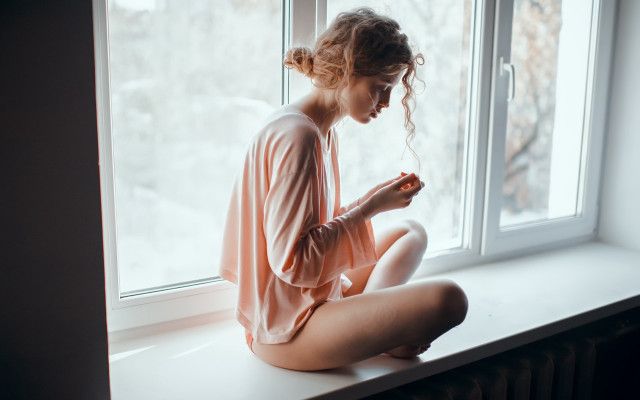 Woman sitting window snow romanticism free wallpaper for desktop - medium preview image