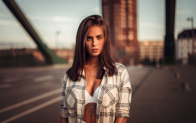 Woman plaid shirt city parking free wallpaper for desktop - medium preview image