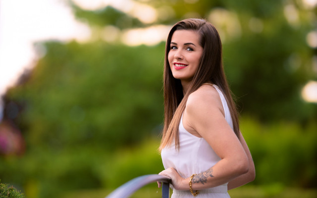 Smiling woman white dress blue free wallpaper for desktop - medium preview image