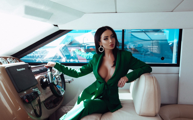 Woman green suit couch boat free wallpaper for desktop - medium preview image